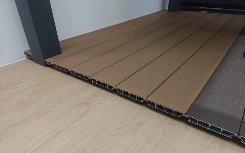 Aluminium decking boards showing hollow profile section